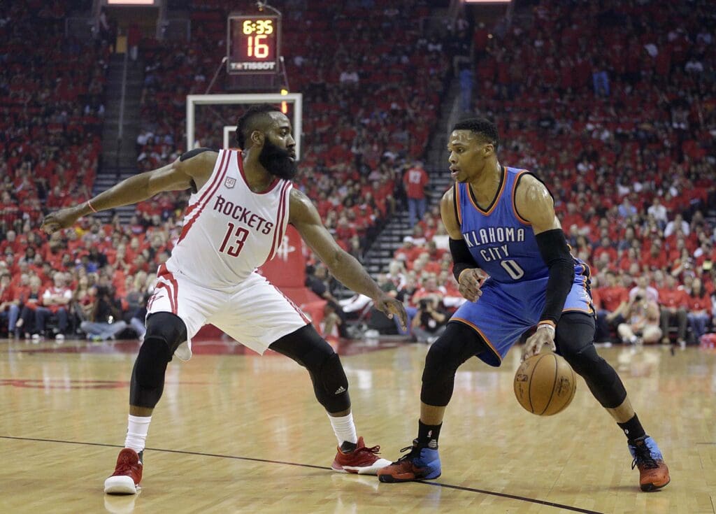 Apr 25, 2017; Houston, TX, USA; Oklahoma City Thunder guard Russell Westbrook (0) dribbles against Houston Rockets guard James Harden (13) in the first quarter in game five of the first round of the 2017 NBA Playoffs at Toyota Center.