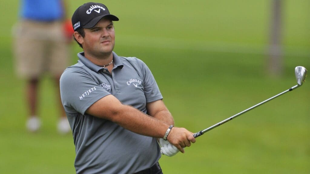 Patrick Reed watches his approach shot on the 13th hole during the first round of The Barclays golf tournament at Ridgewood Country Club.