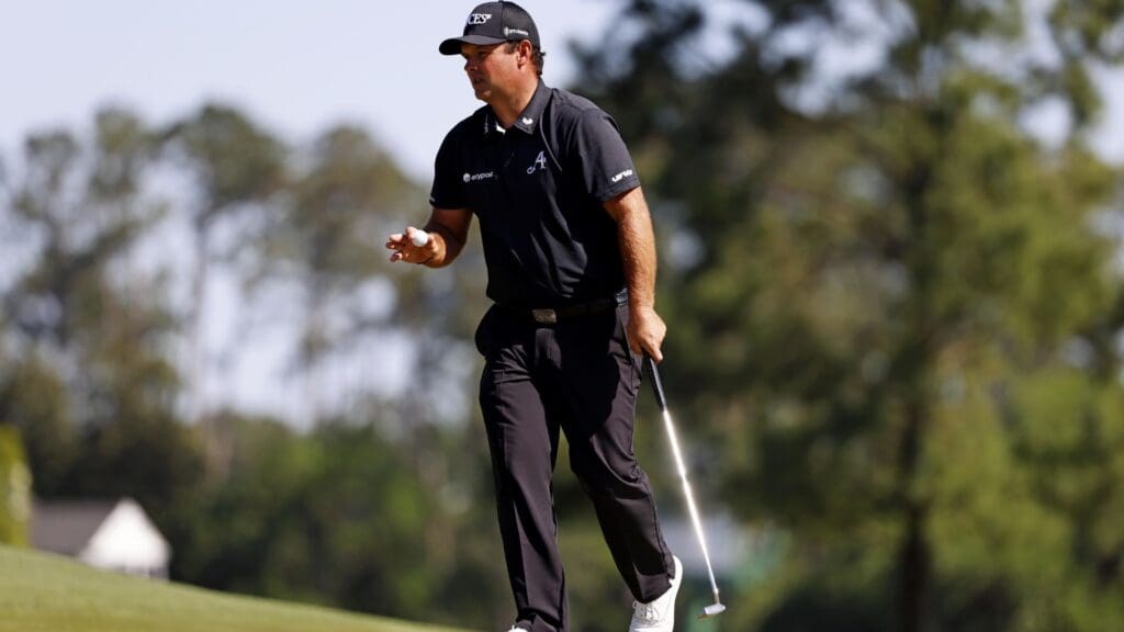 Apr 13, 2025; Augusta, Georgia, USA; Patrick Reed lines up his shot on the eighth green during the final round of the Masters Tournament at Augusta National Golf Club.