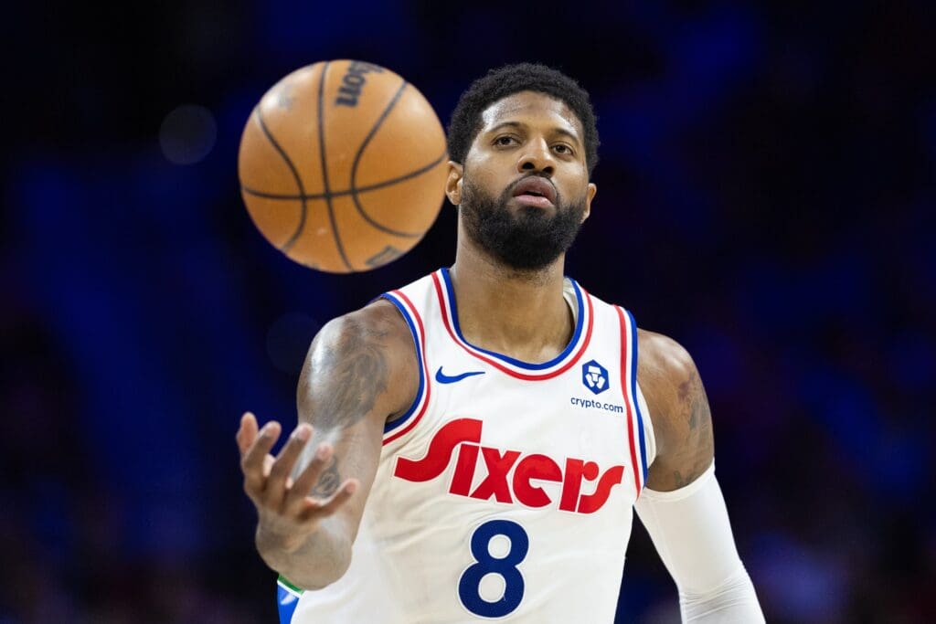 Mar 1, 2025; Philadelphia, Pennsylvania, USA; Philadelphia 76ers forward Paul George (8) catches a ball against the Golden State Warriors during the third quarter at Wells Fargo Center.