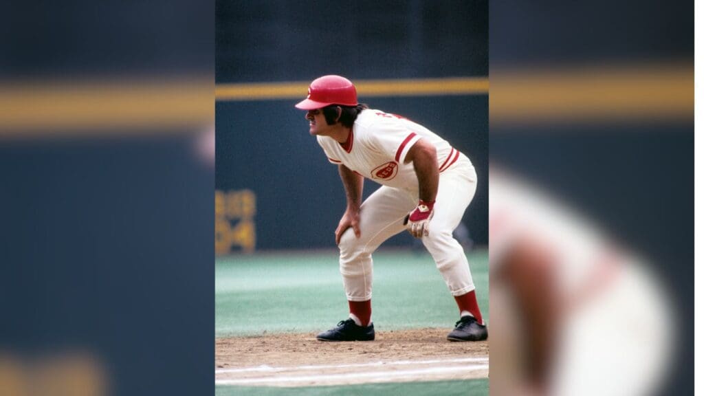May 1976; Cincinnati, OH, USA; FILE PHOTO; Cincinnati Reds outfielder Pete Rose leads off first base during the 1976 season at Riverfront Stadium.