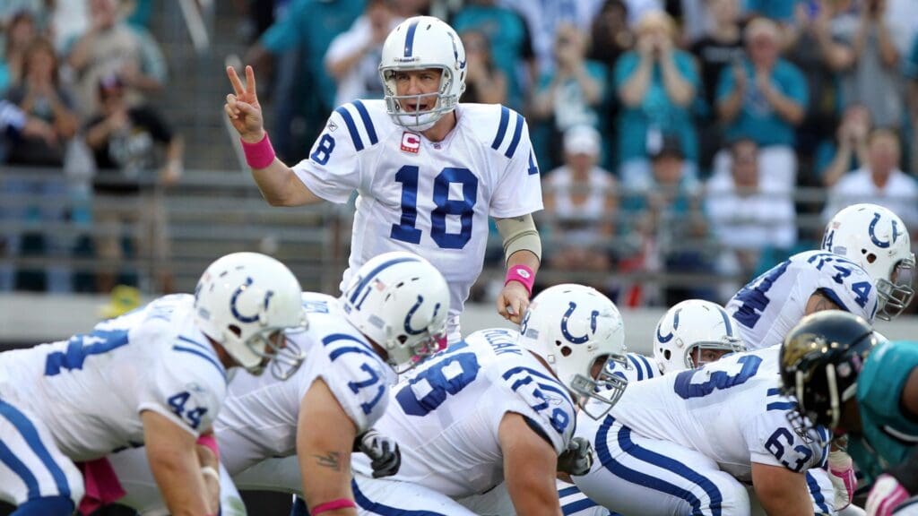 October 3, 2010; Jacksonville FL, USA; Indianapolis Colts quarterback Peyton Manning (18) calls a play on the line of scrimmage during the second half against the Jacksonville Jaguars at EverBank Field.