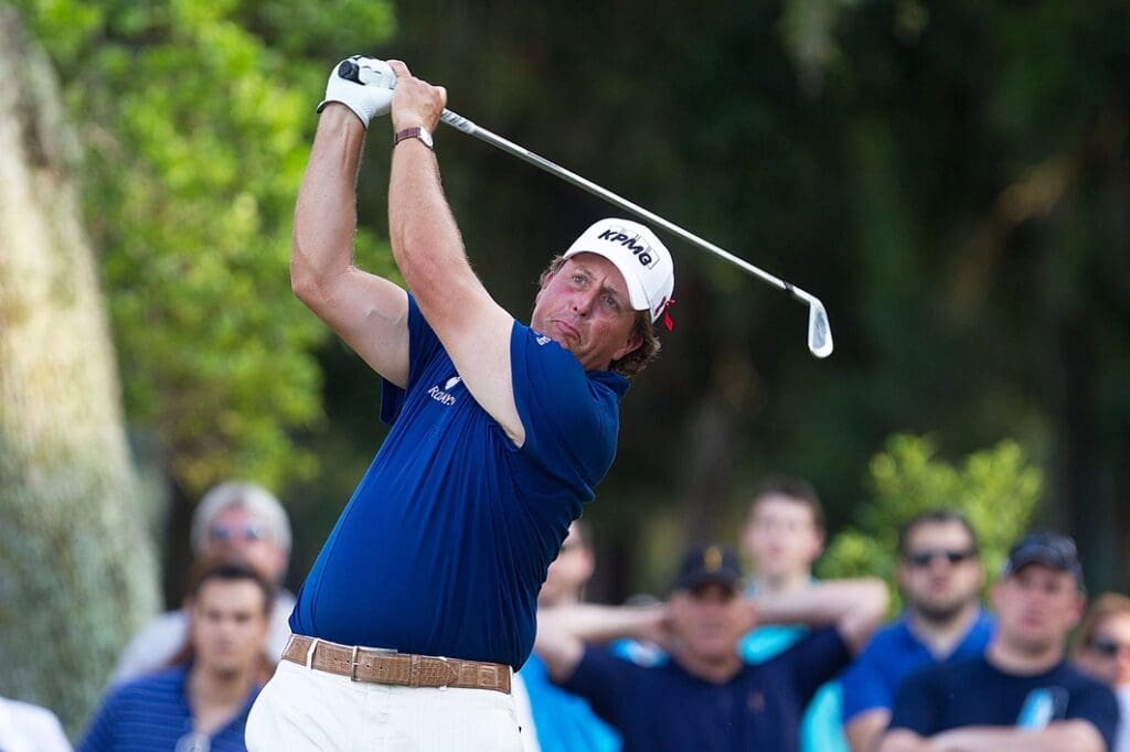 May 14, 2011; Ponte Vedra Beach, FL, USA; Phil Mickelson follows through on his tee shot on the 12th hole during the third round of THE PLAYERS Championship at TPC Sawgrass.