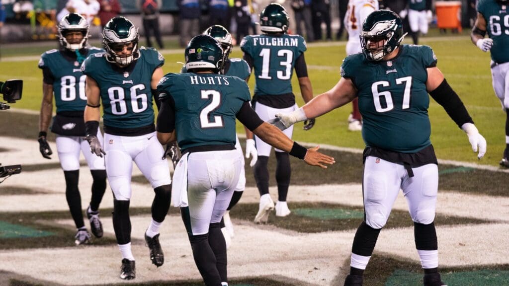 Jan 3, 2021; Philadelphia, Pennsylvania, USA; Philadelphia Eagles quarterback Jalen Hurts (2) celebrates with teammates after a touchdown run against the Washington Football Team during the second quarter at Lincoln Financial Field.
