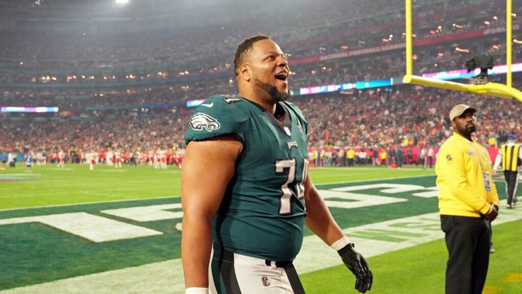Feb 12, 2023; Glendale, Arizona, US; Philadelphia Eagles defensive tackle Ndamukong Suh (74) smiles to the crowd before the start of the third quarter of Super Bowl LVII at State Farm Stadium.