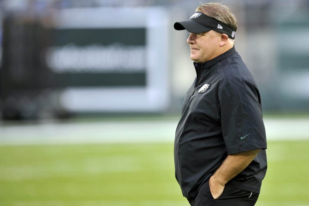 Aug 29, 2013; East Rutherford, NJ, USA; Philadelphia Eagles head coach Chip Kelly takes the field before a pre-season game against the New York Jets at Metlife Stadium