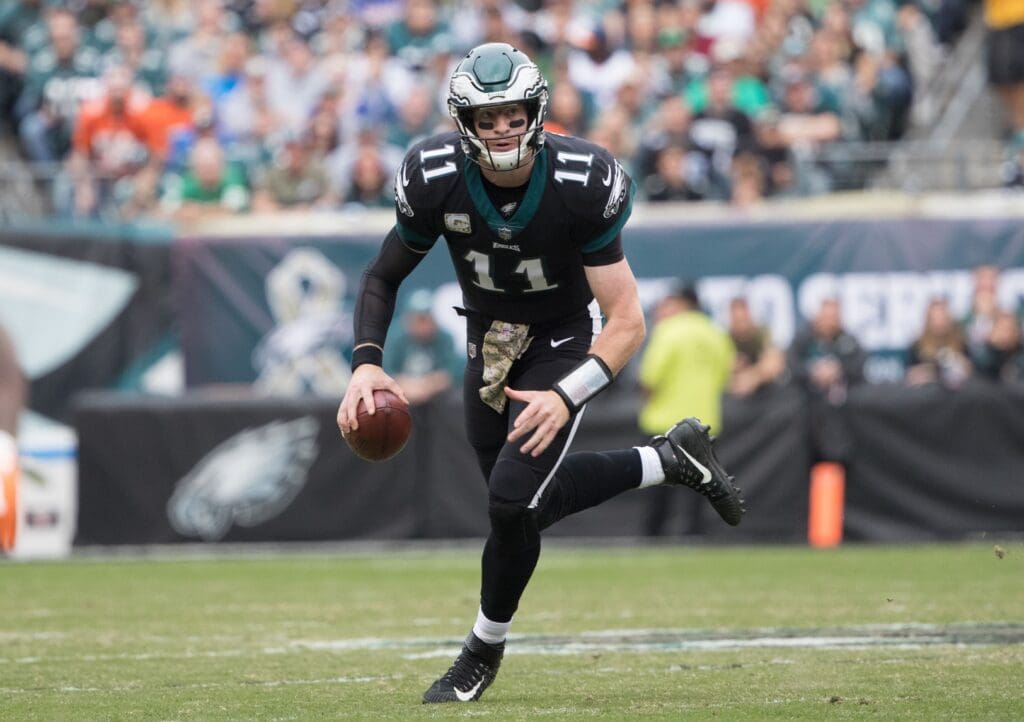 Nov 5, 2017; Philadelphia, PA, USA; Philadelphia Eagles quarterback Carson Wentz (11) runs with the ball against the Denver Broncos during the first quarter at Lincoln Financial Field.
