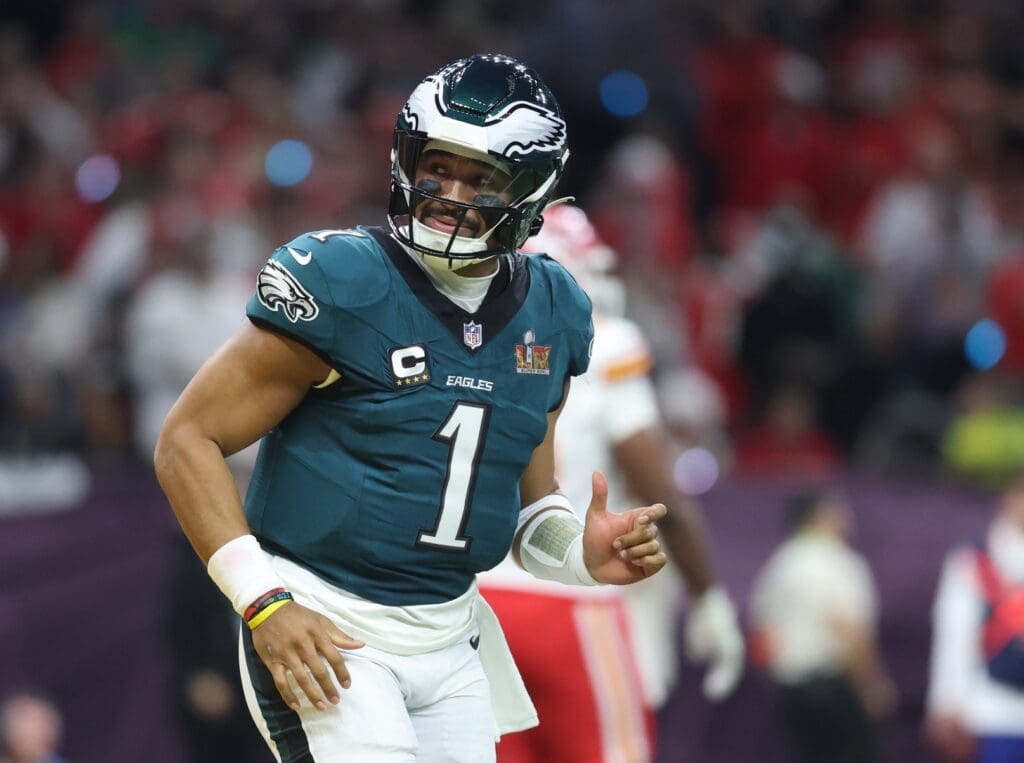 Feb 9, 2025; New Orleans, LA, USA; Philadelphia Eagles quarterback Jalen Hurts (1) reacts after scoring a touchdown against the Kansas City Chiefs in the first quarter in Super Bowl LIX at Ceasars Superdome