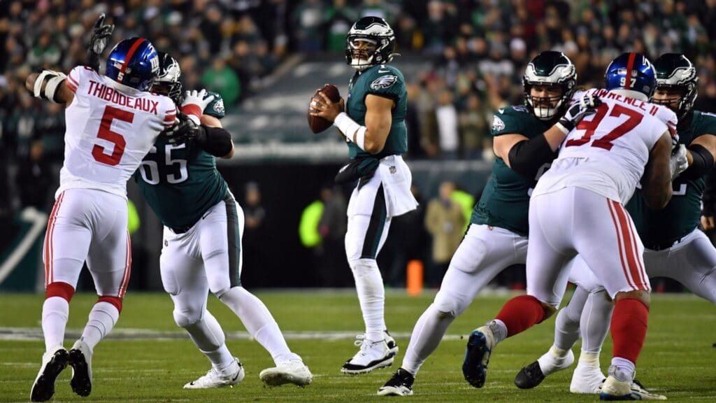 Jan 21, 2023; Philadelphia, Pennsylvania, USA; Philadelphia Eagles quarterback Jalen Hurts (1) looks to pass in the first quarter against the New York Giants during an NFC divisional round game at Lincoln Financial Field.