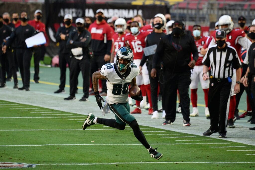 Dec 20, 2020; Glendale, Arizona, USA; Philadelphia Eagles wide receiver Quez Watkins (80) runs for a touchdown after making a catch against the Arizona Cardinals during the first half at State Farm Stadium.