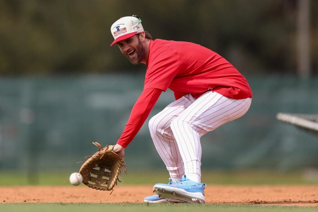 Feb 19, 2025; Clearwater, FL, USA; Philadelphia Phillies first base Bryce Harper (3) takes fielding practice during spring training workouts at BayCare Ballpark.