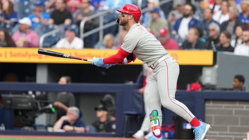 Jun 3, 2025; Toronto, Ontario, CAN; Philadelphia Phillies first baseman Bryce Harper (3) reacts after hitting a home run against the Toronto Blue Jays during the first inning at Rogers Centre.