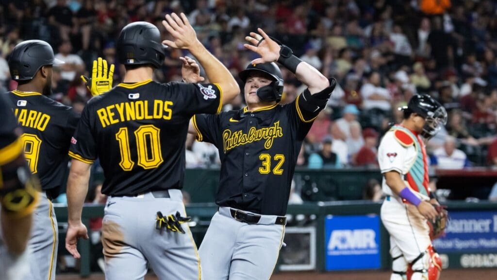May 27, 2025; Phoenix, Arizona, USA; Pittsburgh Pirates catcher Henry Davis celebrates with teammates after hitting a two run home run in the sixth inning against the Arizona Diamondbacks at Chase Field.