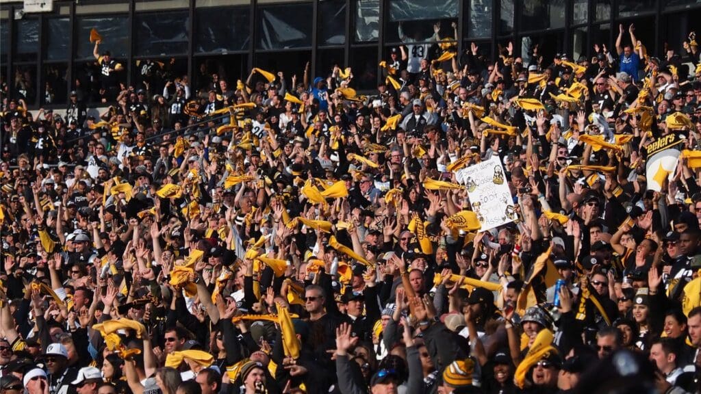 Dec 9, 2018; Oakland, CA, USA; Pittsburgh Steelers fans celebrate as a call is overturned for a touchdown against the Oakland Raiders during the second quarter at Oakland Coliseum