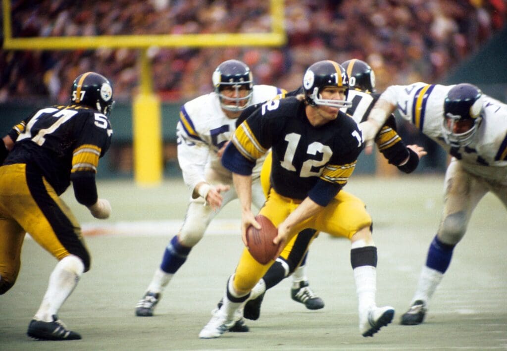 Nov 26, 1972; Pittsburgh, PA, USA; FILE PHOTO; Pittsburgh Steelers quarterback (12) Terry Bradshaw in action against the Minnesota Vikings at Three Rivers Stadium. The Steelers defeated the Vikings 23-10.