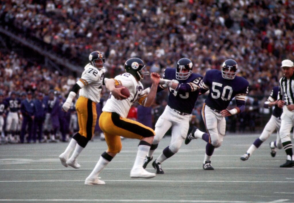 Jan 12, 1975; New Orleans, LA, USA; Pittsburgh Steelers quarterback (12) Terry Bradshaw in action against the Minnesota Vikings during Super Bowl IX at Tulane Stadium. Pittsburgh went on and defeated the Vikings 16-6 and earn their first Super Bowl Championship.