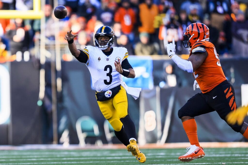 Dec 1, 2024; Cincinnati, Ohio, USA; Pittsburgh Steelers quarterback Russell Wilson (3) throws a pass against the Cincinnati Bengals in the first half at Paycor Stadium.