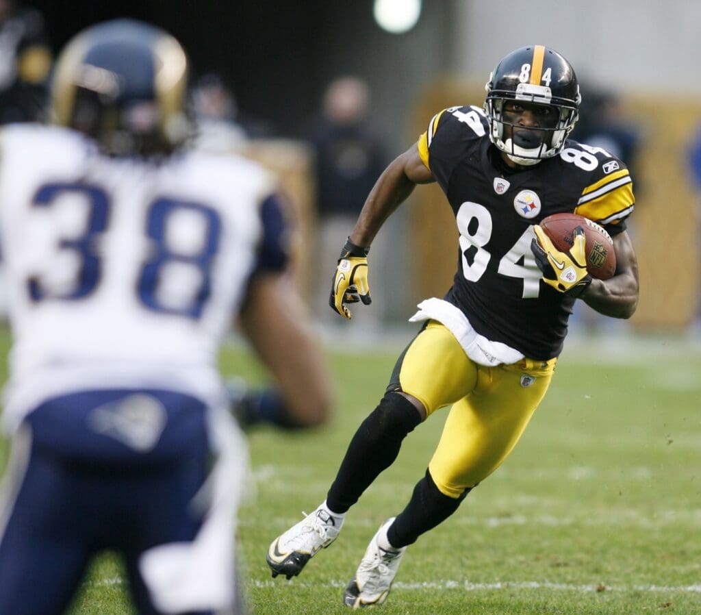 December 24, 2011; Pittsburgh,PA, USA: Pittsburgh Steelers receiver Antonio Brown (84) runs after a pass reception against the St. Louis Rams during the fourth quarter at Heinz Field. The Steelers won 27-0.