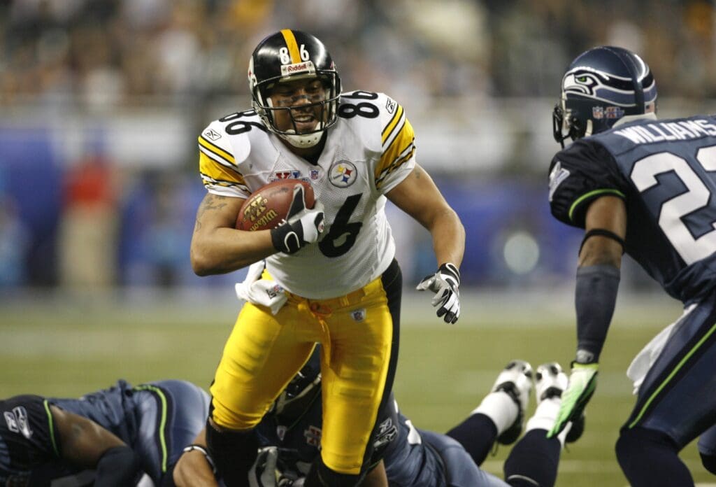 Feb 5, 2006; Detroit, MI, USA; Pittsburgh Steelers wide receiver (86) Hines Ward is tackled by Seattle Seahawks safety Michael Coulware (28) in the third quarter of Super Bowl XL at Ford Field.