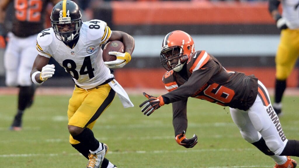 Jan 3, 2016; Cleveland, OH, USA; Pittsburgh Steelers wide receiver Antonio Brown (84) runs with the ball after a catch as Cleveland Browns cornerback Pierre Desir (26) defends during the first quarter at FirstEnergy Stadium.