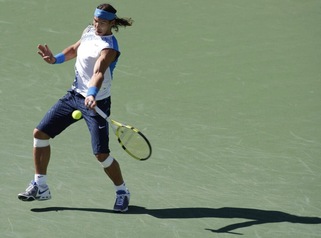 March 17, 2008; Indian Wells, CA, USA; Rafael Nadal (ESP) returns a shot against Donald Young (USA) during the third round of the Pacific Life Open at the Indian Wells Tennis Garden. Nadal defeated Young 6-1, 6-3.