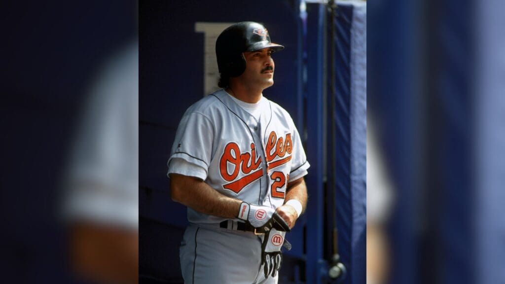 Jul 23, 1995; Kansas City, MO, USA; FILE PHOTO; Baltimore Orioles infielder Rafael Palmeiro in the dugout against the Kansas City Royals at Kauffman Stadium