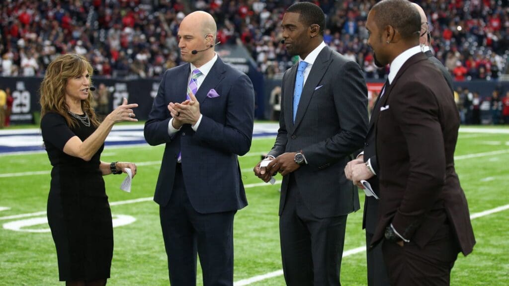 Jan 7, 2017; Houston, TX, USA; (l-r) ESPN reporters Suzy Kolber talks with analyst Matt Hasselbeck, Randy Moss, and Charles Woodson prior to the game with the Houston Texans playing against the Oakland Raiders in the AFC Wild Card playoff football game at NRG Stadium.