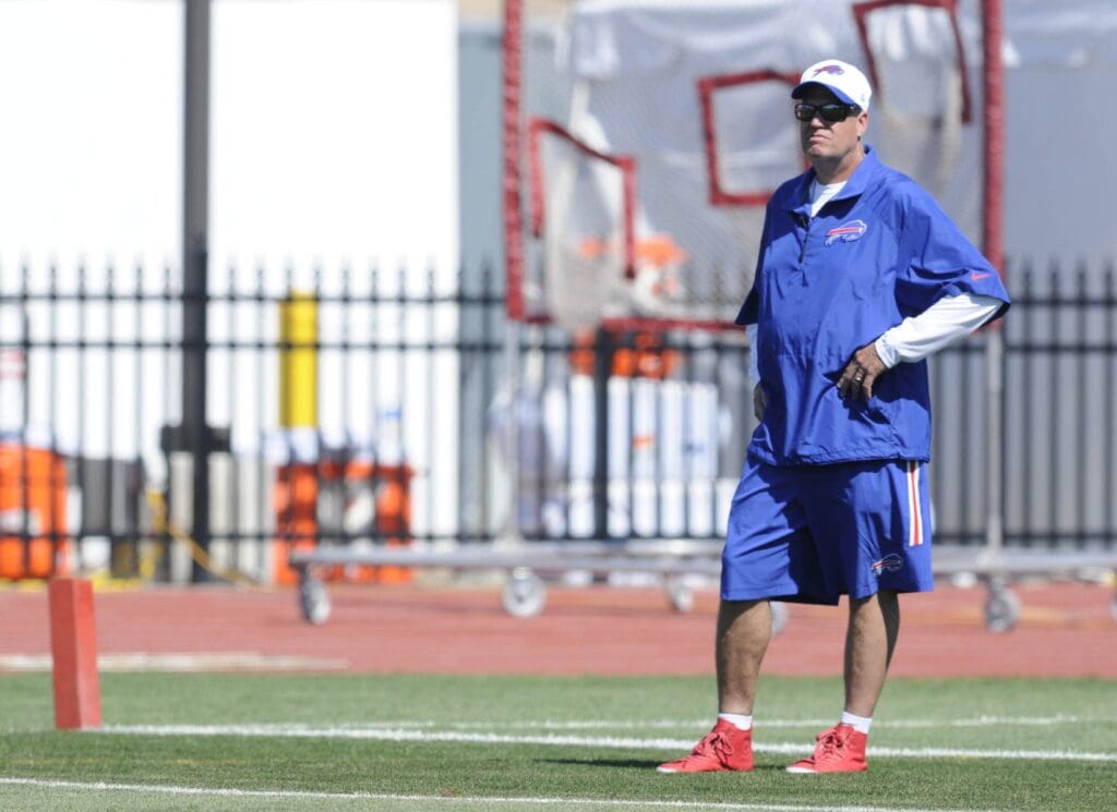 Jul 31, 2015; Pittsford, NY, USA; Buffalo Bills head coach Rex Ryan watches proceedings during training camp at St. John Fisher College.