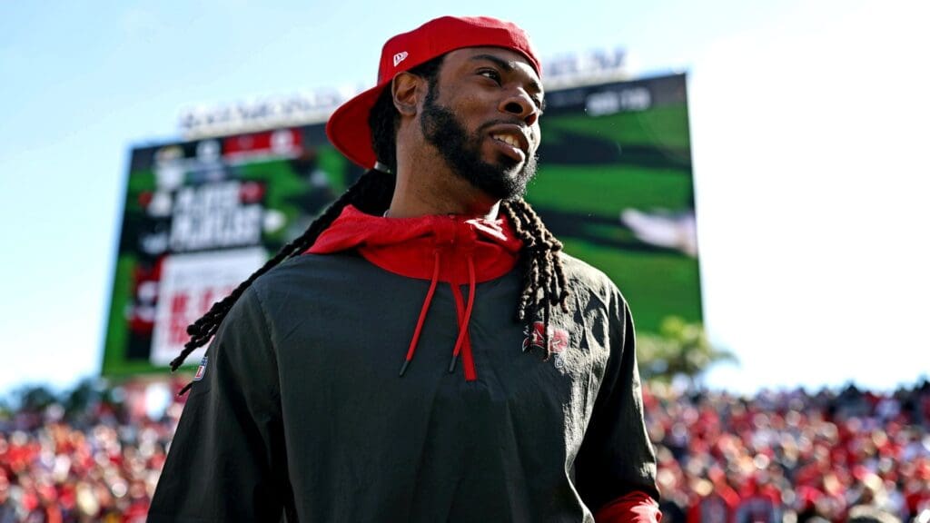 Jan 23, 2022; Tampa, Florida, USA; Tampa Bay Buccaneers cornerback Richard Sherman (5) on the sidelines before playing the Los Angeles Rams in a NFC Divisional playoff football game at Raymond James Stadium.