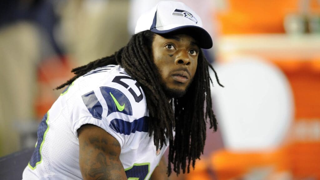 Aug 8, 2013; San Diego, CA, USA; Seattle Seahawks cornerback Richard Sherman (25) on the sidelines during the second half against the San Diego Chargers at Qualcomm Stadium.