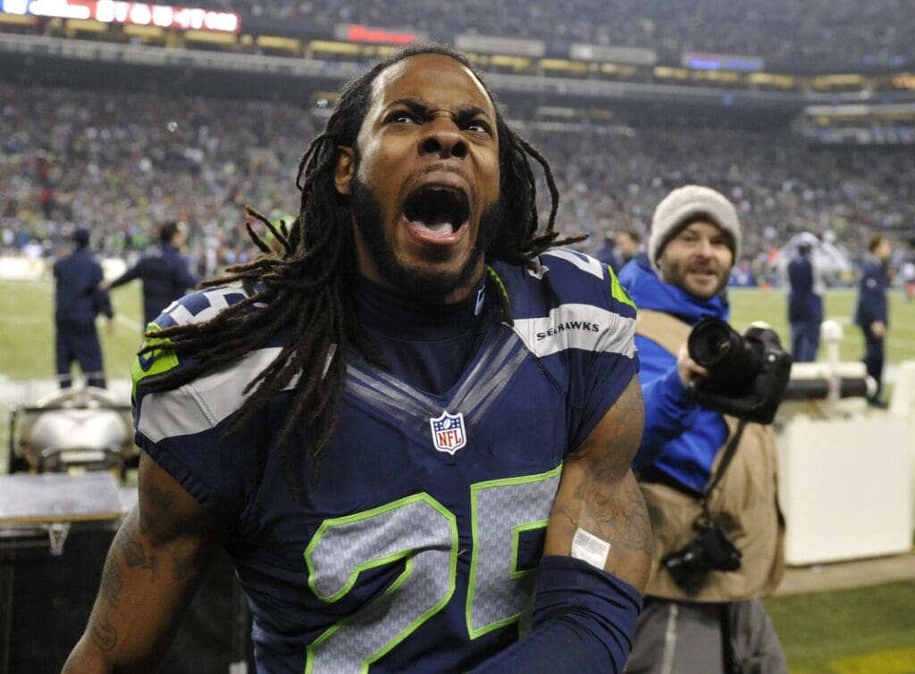Jan 19, 2014; Seattle, WA, USA; Seattle Seahawks cornerback Richard Sherman (25) celebrates after defeating the San Francisco 49ers in the 2013 NFC Championship football game at CenturyLink Field.