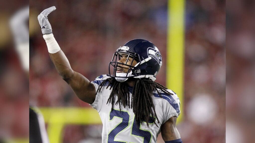 Nov 27, 2014; Santa Clara, CA, USA; Seattle Seahawks cornerback Richard Sherman (25) looks towards the crowd after breaking up a pass against the San Francisco 49ers in the first quarter at Levi's Stadium.