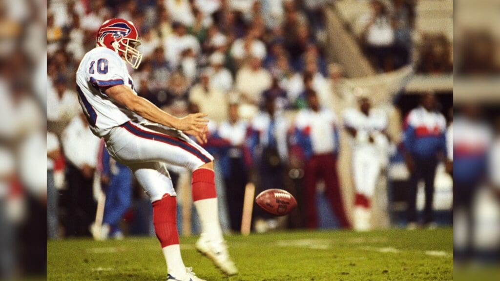 Jan 27, 1991; Tampa, FL, USA; FILE PHOTO; Buffalo Bills punter Rick Tuten (10) punts the ball against the New York Giants during Super Bowl XXV at Tampa Stadium. The Giants defeated the Bills 19-20.
