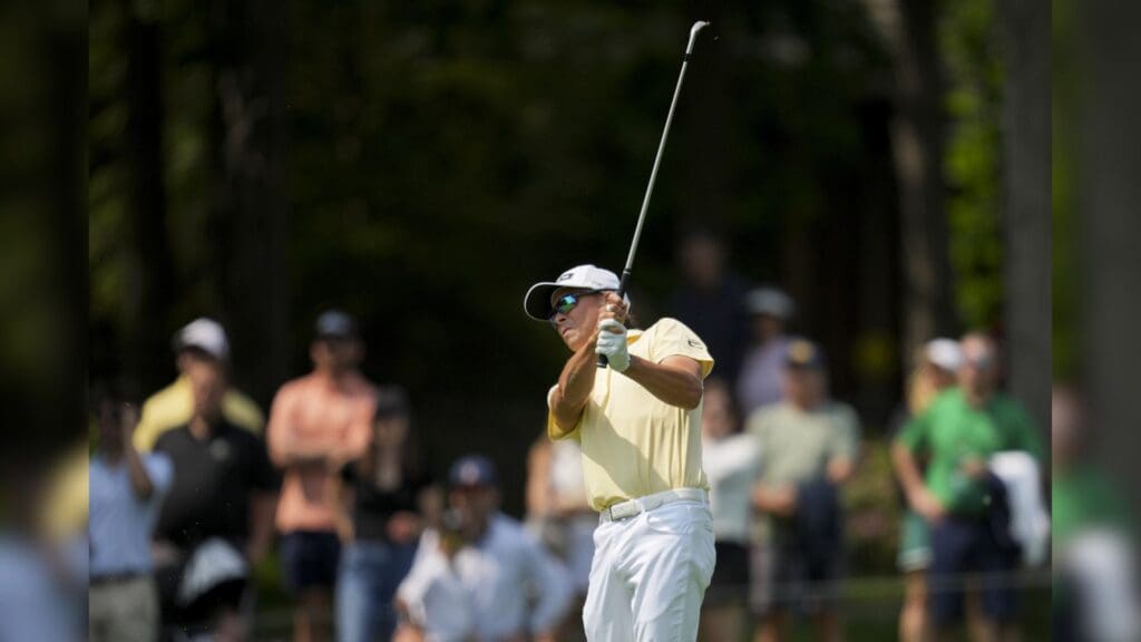 Jun 1, 2025; Dublin, Ohio, USA; Rickie Fowler plays his shot from the fairway on the ninth hole during the final round of the Memorial Tournament presented by Workday golf tournament.