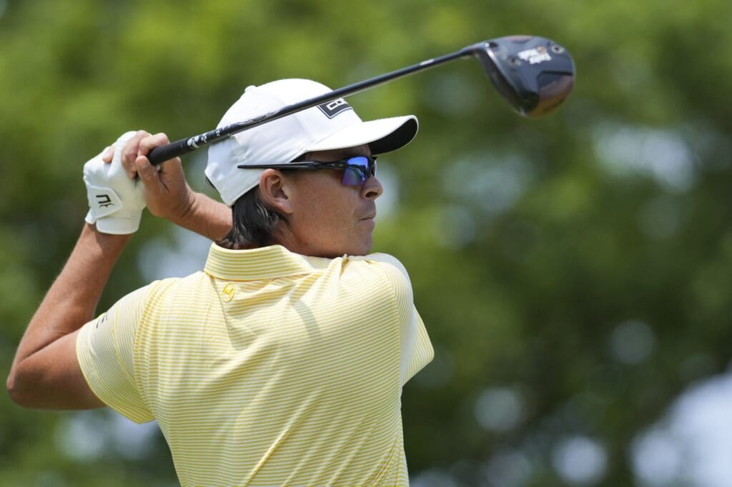 Rickie Fowler plays his shot from the first tee during the final round of the Memorial Tournament presented by Workday golf tournament.