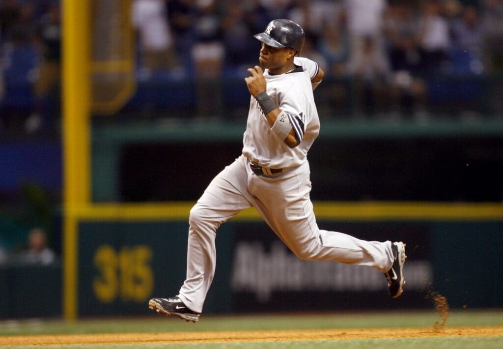 Sep 26, 2007; St. Petersburg, FL, USA; New York Yankees second baseman Robinson Cano rounds third base against the Tampa Bay Devil Rays during the 8th inning at Tropicana Field in St. Petersburg, Florida. Tampa Bay won 7-6.