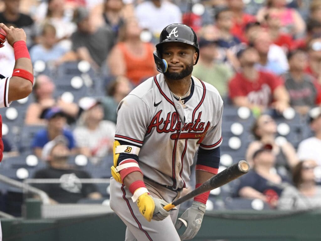 Jul 17, 2022; Washington, District of Columbia, USA; Atlanta Braves second baseman Robinson Cano (22) reacts after hitting a pop out against the Washington Nationals during the ninth inning at Nationals Park.