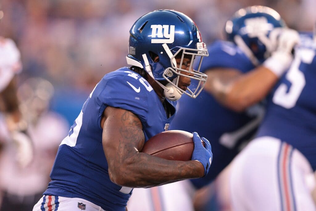 Aug 16, 2019; East Rutherford, NJ, USA; New York Giants running back Rod Smith (45) carries the ball during the first half against the Chicago Bears at MetLife Stadium.