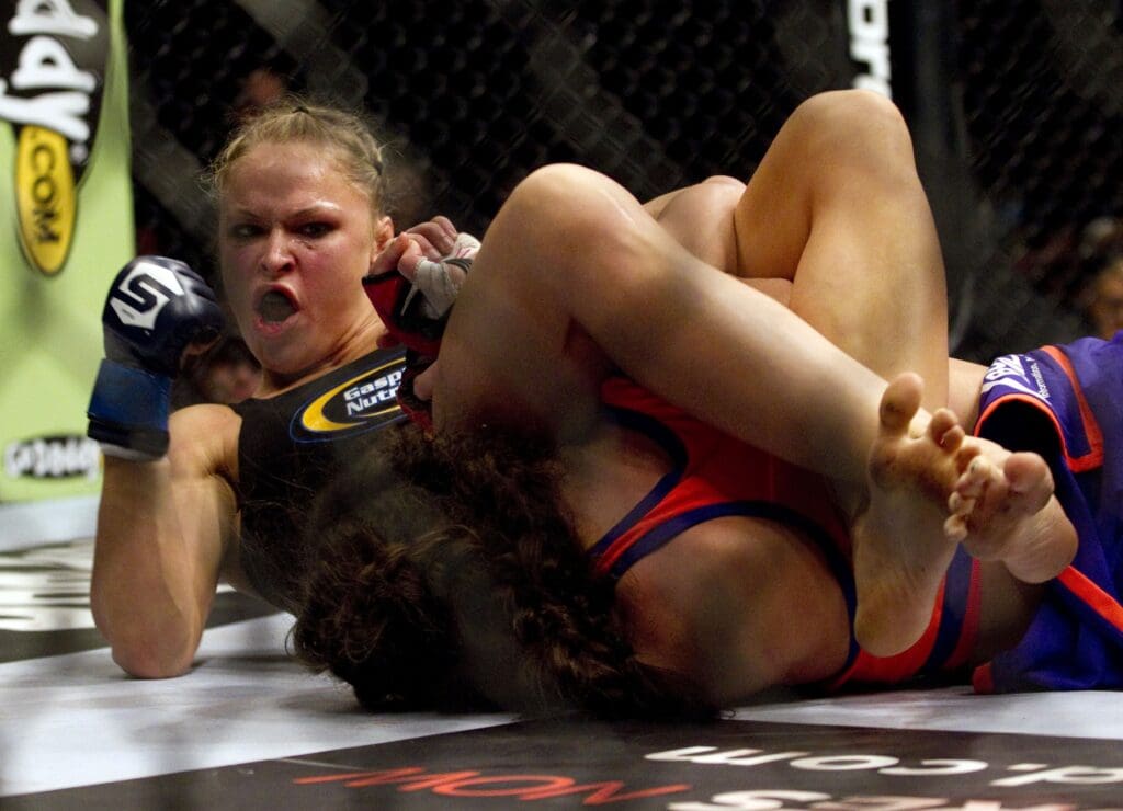 March 3, 2012; Columbus, OH, USA; Ronda Rousey punches Miesha Tate during the Strikeforce Grand Prix final at Nationwide Arena.