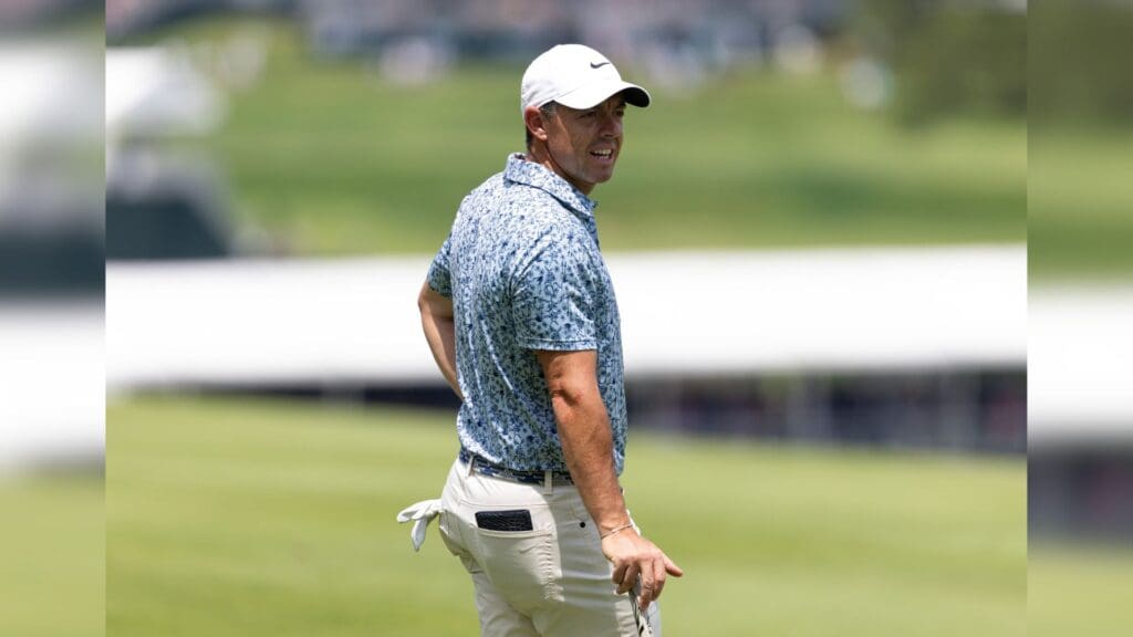 Jun 21, 2025; Cromwell, Connecticut, USA; Rory McIlroy looks on after playing his second shot on the second hole during the third round of the Travelers Championship golf tournament.