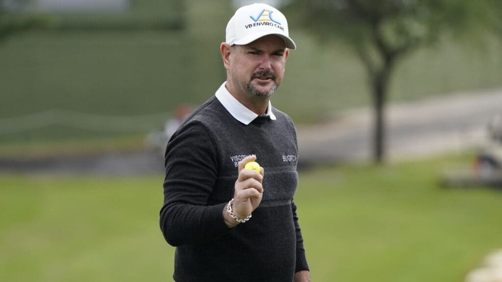 May 13, 2021; McKinney, Texas, USA; Rory Sabbatini acknowledges the gallery after sinking his put on the 18th green during the first round of the AT&T Byron Nelson golf tournament.