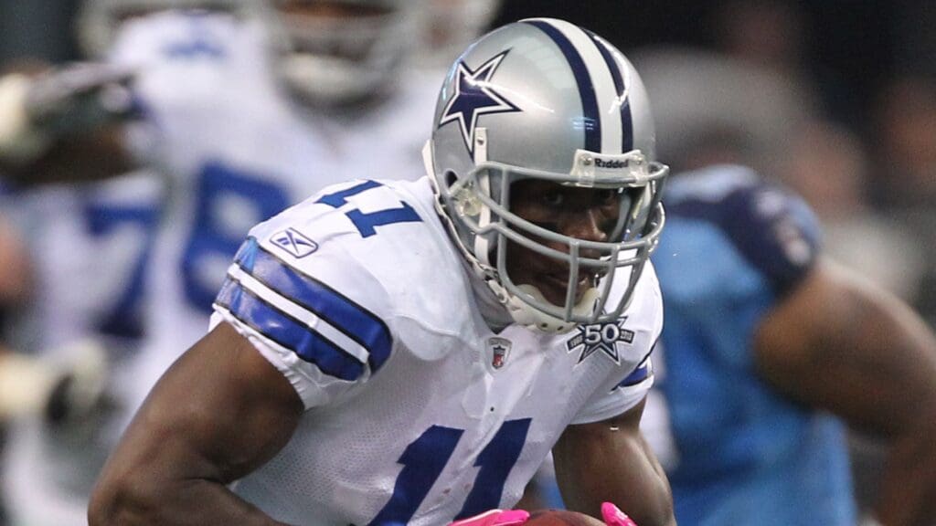 Oct 10, 2010; Arlington, TX, USA; Dallas Cowboys Roy Williams (11) runs after a catch in the second quarter against the Tennessee Titans at Cowboys Stadium.