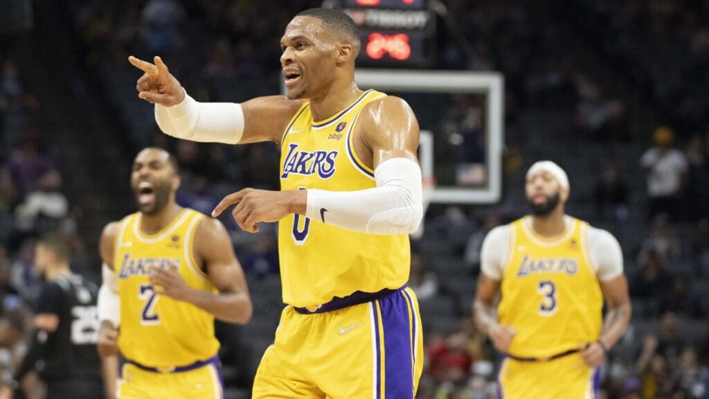November 30, 2021; Sacramento, California, USA; Los Angeles Lakers guard Russell Westbrook (0) celebrates after a play during the third quarter against the Sacramento Kings at Golden 1 Center.