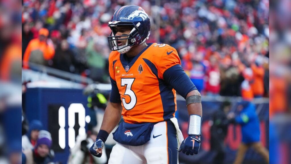 Oct 29, 2023; Denver, Colorado, USA; Denver Broncos quarterback Russell Wilson (3) celebrates a touchdown pass in the fourth quarter against the Kansas City Chiefs at Empower Field at Mile High.