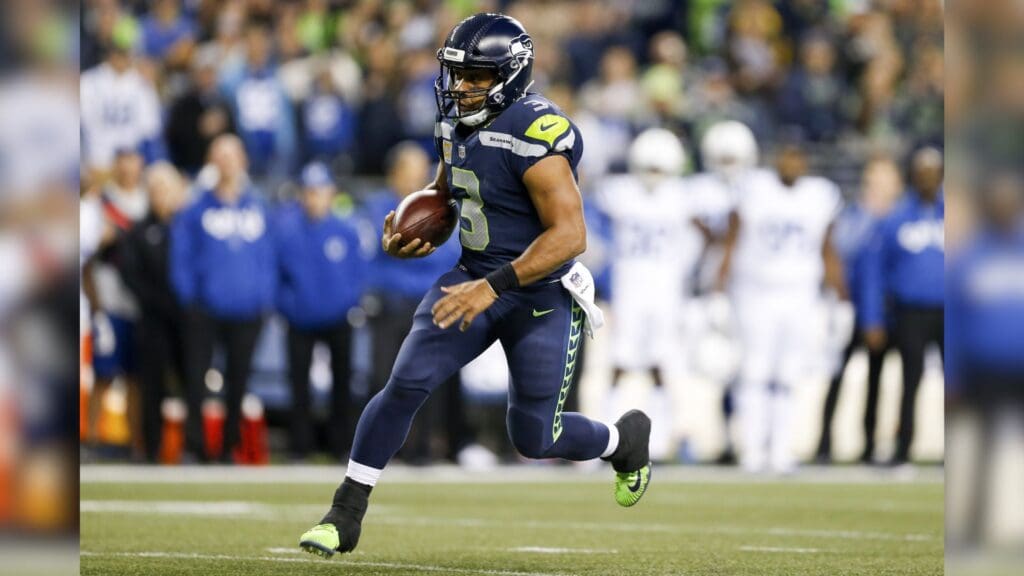 Oct 1, 2017; Seattle, WA, USA; Seattle Seahawks quarterback Russell Wilson (3) rushes for a touchdown against the Indianapolis Colts during the third quarter at CenturyLink Field.