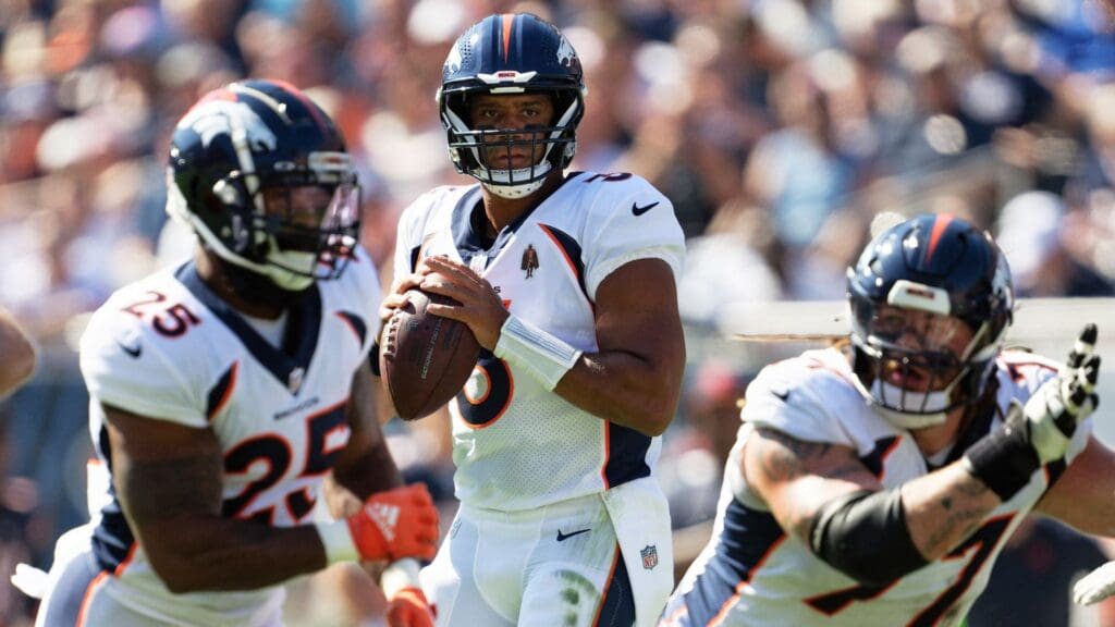 Oct 1, 2023; Chicago, Illinois, USA; Denver Broncos quarterback Russell Wilson (3) passes against the Chicago Bears at Soldier Field