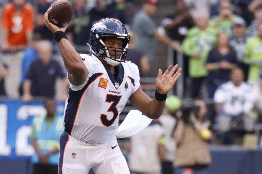 Sep 12, 2022; Seattle, Washington, USA; Denver Broncos quarterback Russell Wilson (3) passes against the Seattle Seahawks during the first quarter at Lumen Field