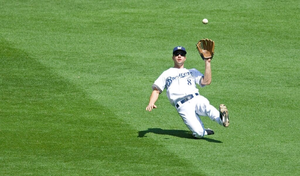 June 14, 2009; Milwaukee, WI, USA; Milwaukee Brewers left fielder Ryan Braun (8) makes a sliding catch on a fly ball hit by Chicago White Sox pinch hitter Jayson Nix (not pictured) during the seventh inning at Miller Park. The White Sox defeated the Brewers 5-4.