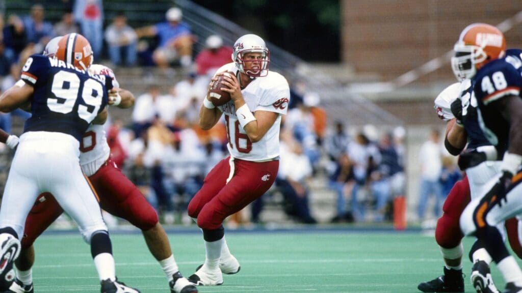 Sep 20, 1997; Champaign, IL, USA; FILE PHOTO; Washington State Cougars quarterback Ryan Leaf (16) in action against the Illinois Illini at Memorial Stadium.