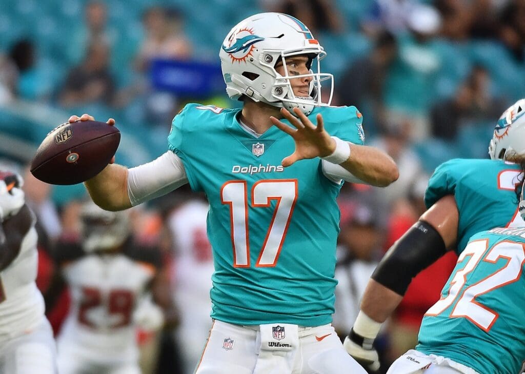 Miami Dolphins quarterback Ryan Tannehill (17) attempts a pass against the Tampa Bay Buccaneers during the first half at Hard Rock Stadium.